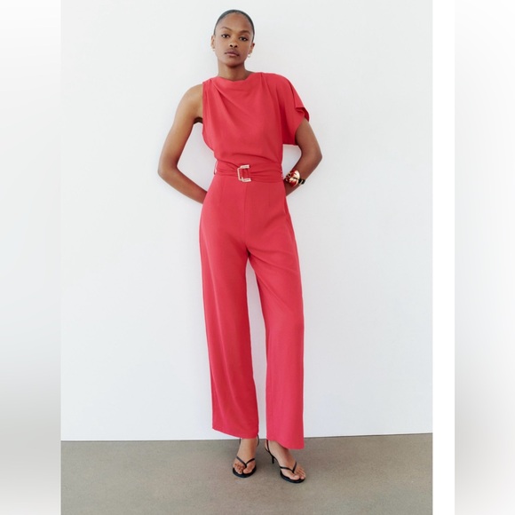 ASYMMETRIC CREPE BUCKLE JUMPSUIT
RED / CORAL . SIZE M, L - Picture 2 of 16